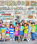Children in front of map bulletin board set with travel theme for classrooms, colorful map cutouts and motivational words for learning.