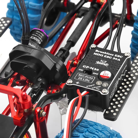 Close-up of 4500KV Brushless Outrunner Motor With Transmission And 30A ESC Upgrade For SCX24 RC Crawler, showing wiring and components.
