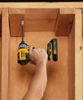 Using FlexTorq Magnetic Bit Holder for Impact Tools, 2 Inch Length, on a wooden frame for secure fastening with flex and magnetic lock.