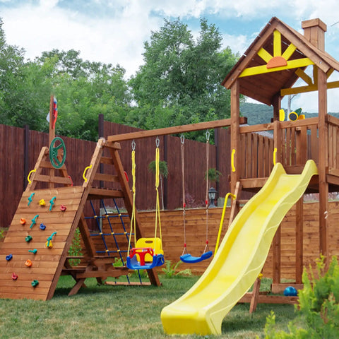 Kids Outdoor Playground Accessories Swingset Attachments With Pirate Ship Wheel Toy Telescope Telephone And Safety Handles In Yellow And Green Built To Last Durable Playset Add Ons featuring climbing wall, swings, and yellow slide in backyard setting.