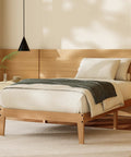Built Different Twin Xl Wood Bed Frame With Solid Rubberwood Platform Base showcasing natural finish in a cozy bedroom setting.