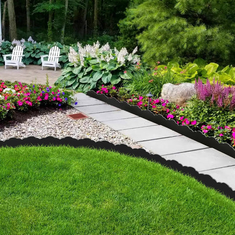 Durable 33 Ft No Dig Landscape Edging Border With 50 Spikes 4 Inch Tall Plastic Lawn Edging For Yard Pathways And Flower Beds Black Cloud Shaped Design Easy Install surrounding a garden pathway.