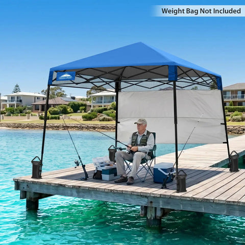 Man fishing under 8x8 Pop Up Canopy Tent With Sidewall, Compact Portable Sun Shelter For Beach, Sports, And Camping, Blue System