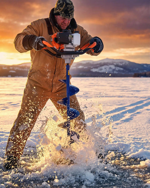 Person using Beefy 52cc Gas Powered Post Hole Digger With 10 Inch Bit And 31 5 Inch Shaft on snowy terrain at sunset