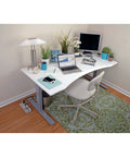 Six Outlet Surge Protector Power Strip With Six Foot Cord And Right Angle Plug For Home Office And Electronics Protection visible under desk