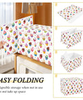 Badass Foldable Storage Bin With Heavy Duty Frame And Padded Handles For Home Organization 300D Oxford Fabric Clothes Cube showing colorful cupcake design and easy folding feature.