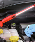 Mechanic using Slick Slim Inspection Lamp With Magnetic Work Light, 360 Degree Swivel And Tilt, Dimmer Switch, Two Lighting Modes
