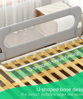 Foldable Toddler Bed Rail Guard With Bulletproof Anchor Strap And Zero Slide Base Design Heavy Duty Grey showing U-shaped base design.
