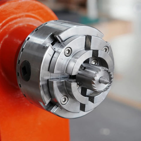 Top Tier Crown Drive Center With Spring Loaded Point fits most four jaw chucks, showing multitooth design for secure timber grip.