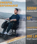 Person riding 4-Wheel Foldable Electric Mobility Scooter For Adults And Seniors, 500W Motor, black, all-terrain use