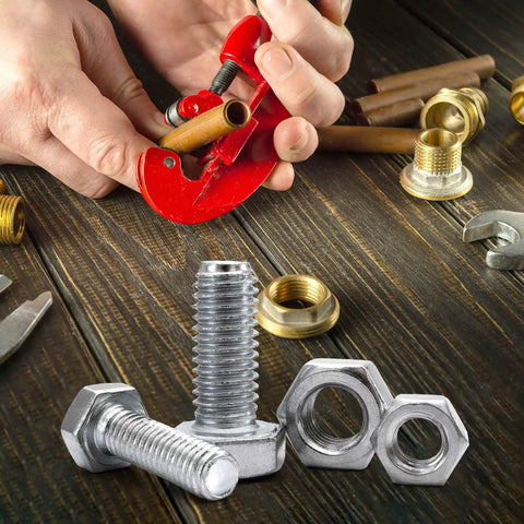 Hardened Brass Flat Washers Assortment Kit 110 Pack M3 Copper Crush Washers For Bolts And Screws 7Mm Outer Diameter 0.5Mm Thick being used with tools.