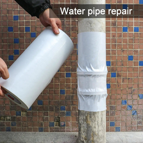 Person using 12 Inch Wide Duct Tape Beefy Heavy Duty 9 Mil Industrial Grade Waterproof Tape 90 Feet Long Flexible No Residue White Tape for pipe repair.