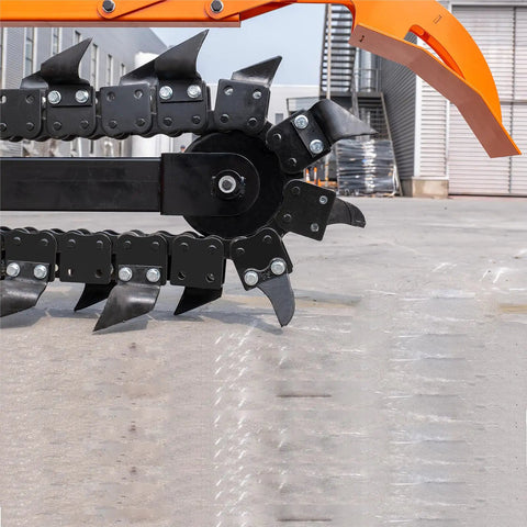 Workhorse Skid Steer Trencher Attachment with beefy steel frame and tungsten carbide teeth on pavement