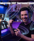 Man gaming with Ultra Lightweight Wired Gaming Headset With Microphone For Xbox Series X S PS5 PS4 Switch And PC, smiling