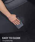 Cleaning Juniper Center Console Side Anti Kick Mats for Tesla Model Y 2025 2026 Refresh with damp rag
