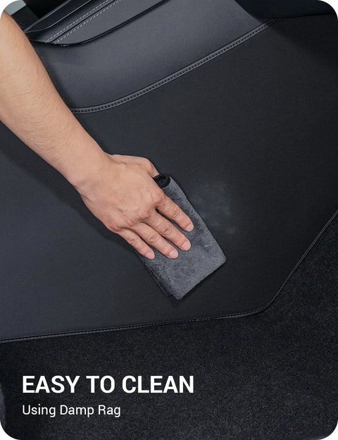 Cleaning Juniper Center Console Side Anti Kick Mats for Tesla Model Y 2025 2026 Refresh with damp rag