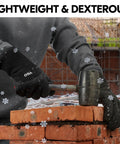 Person wearing Five Pairs Freezer Winter Work Gloves With Double Lining And Rubber Latex Coating For Outdoor Heavy Duty Tasks In Cold Weather Size M Black RB6032 Built For Tough Jobs And All Weather Grippy Palm handling bricks in snow