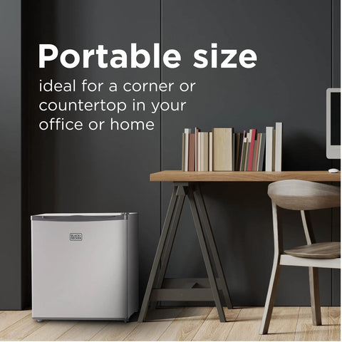 Compact Upright Freezer One Point Two Cubic Feet Portable Chill Station Ample Snack Storage Adjustable Leveling Legs Crisp White Exterior in office corner