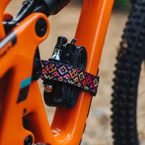 Bike Tire Levers With Chain Master Link Pliers Kit For Mountain Road BMX Bikes, secured on orange bike frame with colorful strap