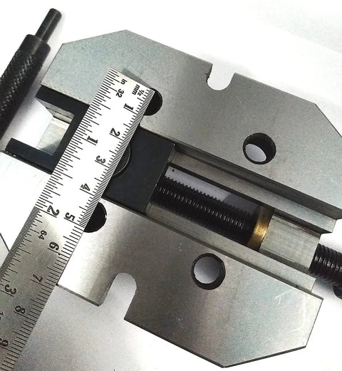 Heavy Duty Two And Three Eighths Inch Jaw Width Grinding Steel Vice With Hardened Ground Finish For Precision Milling And Toolroom Use Providing Vibration Free Clamping And Stable Workholding. steel grinding vice with ruler, top view