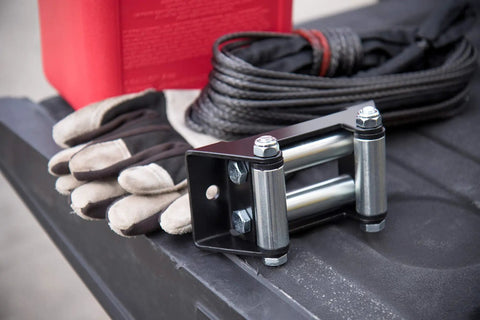Roller Fairlead For 3500 Lb And Under ATV UTV Winches With Stainless Steel Rollers, black frame, on vehicle bed with gloves and rope