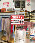 Two Pack No Public Restroom Signs For Biz And Home Self Adhesive Weatherproof Vinyl Stickers displayed in various store settings