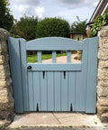 Built Tough Heavy Duty Matte Black Barn Door Pull Handle Solid Zinc Alloy Ring Knob For Sliding Doors Fences Gates Shutters And Patios on a blue garden gate.