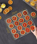 Dehydrated citrus slices arranged on a 25cm stainless steel tray, perfect for use with the Six Layer Stainless Steel Food Dehydrator And Fruit Dryer Machine For Vegetables Meat Jerky Built Damn Tough With Slick Mechanical Timer Control A Smooth Everyday Kitchen Essential For Kickin Flavor Lock.