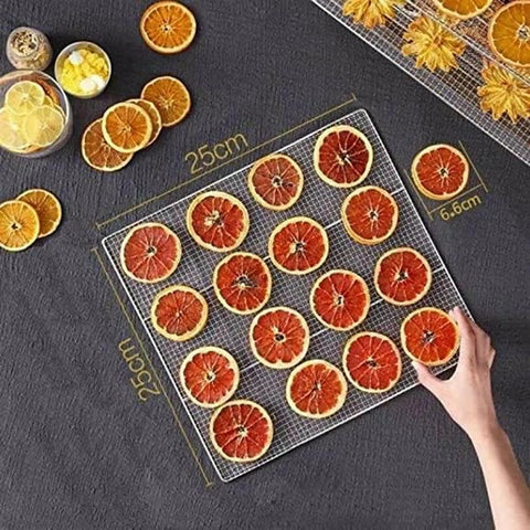 Dehydrated citrus slices arranged on a 25cm stainless steel tray, perfect for use with the Six Layer Stainless Steel Food Dehydrator And Fruit Dryer Machine For Vegetables Meat Jerky Built Damn Tough With Slick Mechanical Timer Control A Smooth Everyday Kitchen Essential For Kickin Flavor Lock.