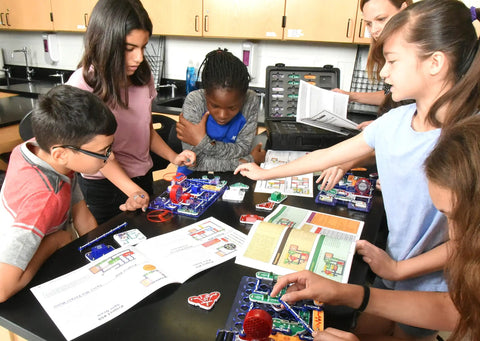 Children using Extreme Electronics Exploration Kit For Kids 8 Plus With Hands On Projects And Student Training Program Study Guide