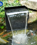 Easy Install Pond Waterfall Spillway Kit With 660 GPH Pump installed in a koi pond with stainless steel waterfall box and tubing