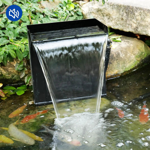 Easy Install Pond Waterfall Spillway Kit With 660 GPH Pump installed in a koi pond with stainless steel waterfall box and tubing