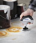 16 Piece Versa Power Scrubber Accessory Value Kit used on paint stains, with 15 Cleaning Pads for tough grime removal.