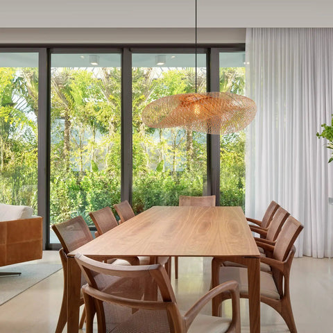 Farmhouse Bamboo Woven Pendant Light Fixture Handwoven Natural Bamboo Twisted Lampshade in dining room with large windows.
