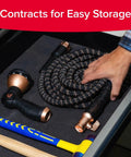 50 Foot Expandable Garden Hose Featuring Tough Copper Blend Core And Adjustable 10 Spray Pattern Dial For Hassle Free Kink Free Backyard Watering Jobs coiled with spray nozzle.