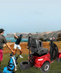 Badass Two In One Electric Golf Cart And Adult Mobility Scooter with wide tires near a golf player on course.