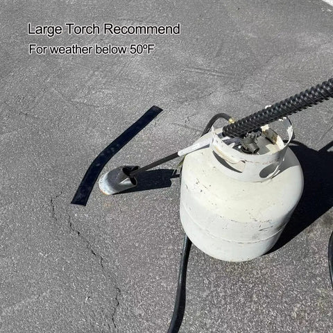Real Beefy Rubberized Asphalt Crack Sealer Tape, 3 Mm Thick Premium Roll 3 Inches By 65 Feet, outside setup with propane torch and tape.