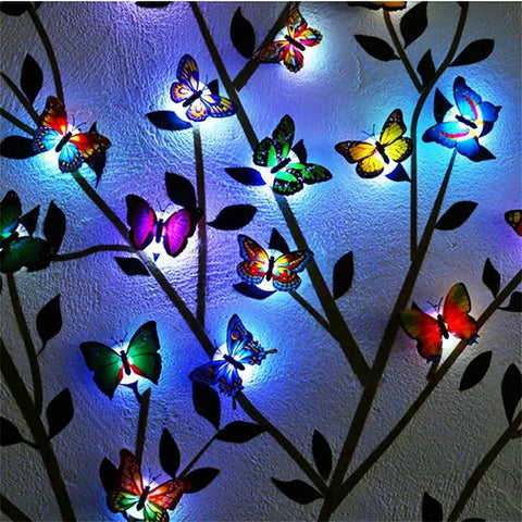 Dope LED Butterfly Decoration Lights Set Of 12 For Garden And Backyard Wall Decor, colorful illuminated butterflies on a wall