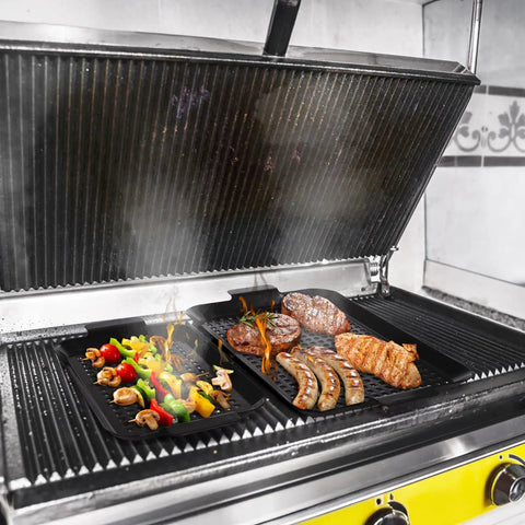 Heavy Duty Nonstick Grill Pan Set For Outdoor Barbecue Cooking Includes Two Durable Carbon Steel Trays grilling vegetables and meats.