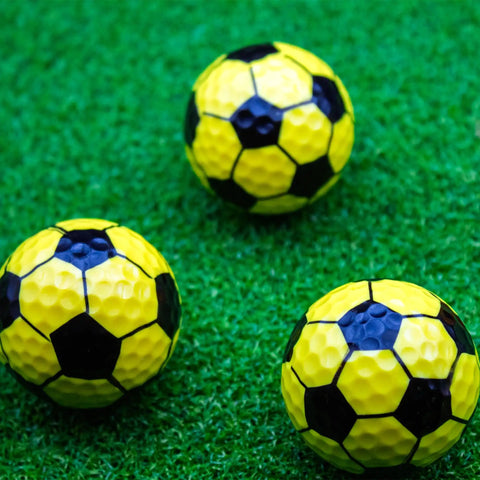 Bright Yellow Soccer Golf Balls Set Of 12 With 360 Degree Soccer Design for players and fans on green grass