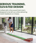 Man putting on 9 Foot 6 Inch Putting Mat With Automatic Ball Return For Indoor Use Two Hole Putting Green Designed For Home And Office