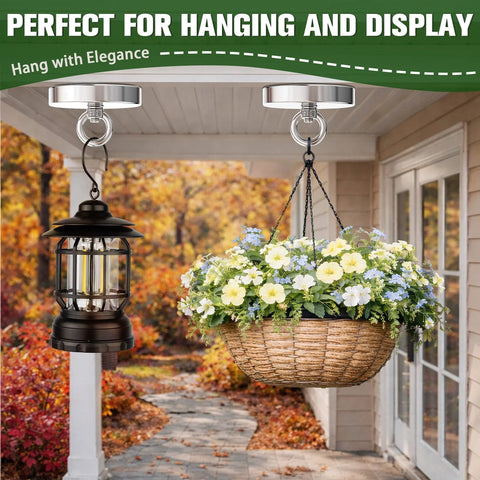 Two ceiling-mounted magnetic hooks suspend a black metal lantern and a wicker flower basket.