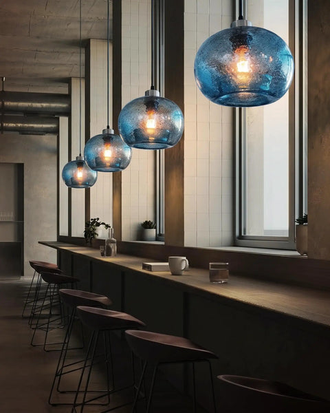 Stylish Hand Blown Glass Pendant Lights For Kitchen Island In Blue Marble Finish Modern Rustic Farmhouse Style With Brushed Nickel Hardware 8.7 Inch Diameter 2 Pack installed in kitchen