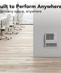 High Capacity Wall Heater With Built In Adjustable Thermostat 1500W 120 240V White installed in modern office space.