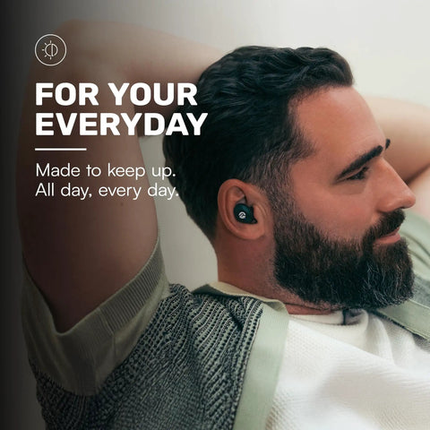 Man wearing Everyday Classic Bluetooth Earbuds With Mic And Active Noise Cancellation For Immersive Sound On The Go.