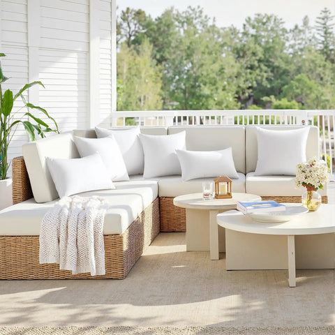 18x18 Outdoor Throw Pillows Set Of 4 Waterproof Cushions on patio furniture in a garden setting with soft 7D polyester fill
