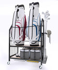 Two Level Golf Bag Organizer With Movable Lockable Wheels Dual Bag Rack For Two Golf Bags And Club Holder Extra Side Club Stand And Bottom Drawers For Balls And Accessories Ideal Garage Golf Gear Storage Solution shown from front angle with two golf bags and accessories.