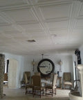 Interior view showing installed Glue Up Foam Ceiling Tiles White Pack Of Eight Covering 21.6 Square Feet Lightweight Insulating Popcorn Ceiling Cover Paintable With Water Based Paint Easy To Install And Clean in a dining room.