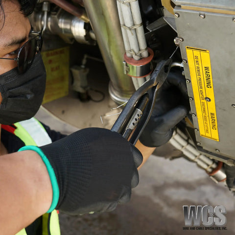 Technician using 10.5 Inch Safety Wire Pliers With One Pull Action Wire Twister And Stainless Steel Cutter on machinery