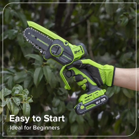 Compact 24V Brushless Mini Chainsaw Electric Pruning Saw For Tree Branch Trimming held by a gloved hand in green, ideal for easy cutting.
